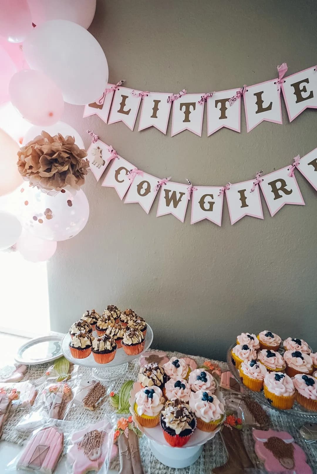Little cowgirl baby shower cupcake display