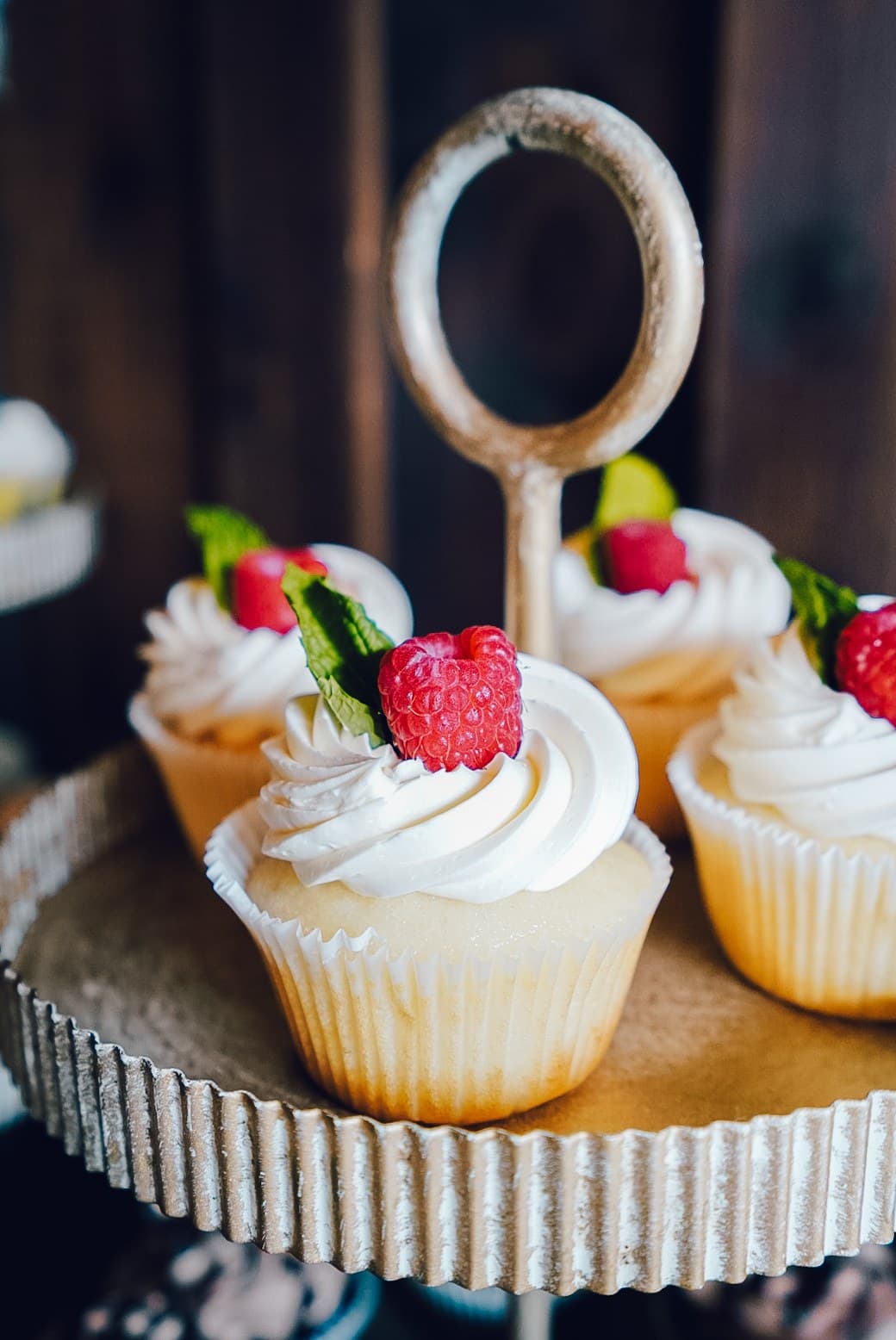 Raspberry cupcakes on a tiered stand