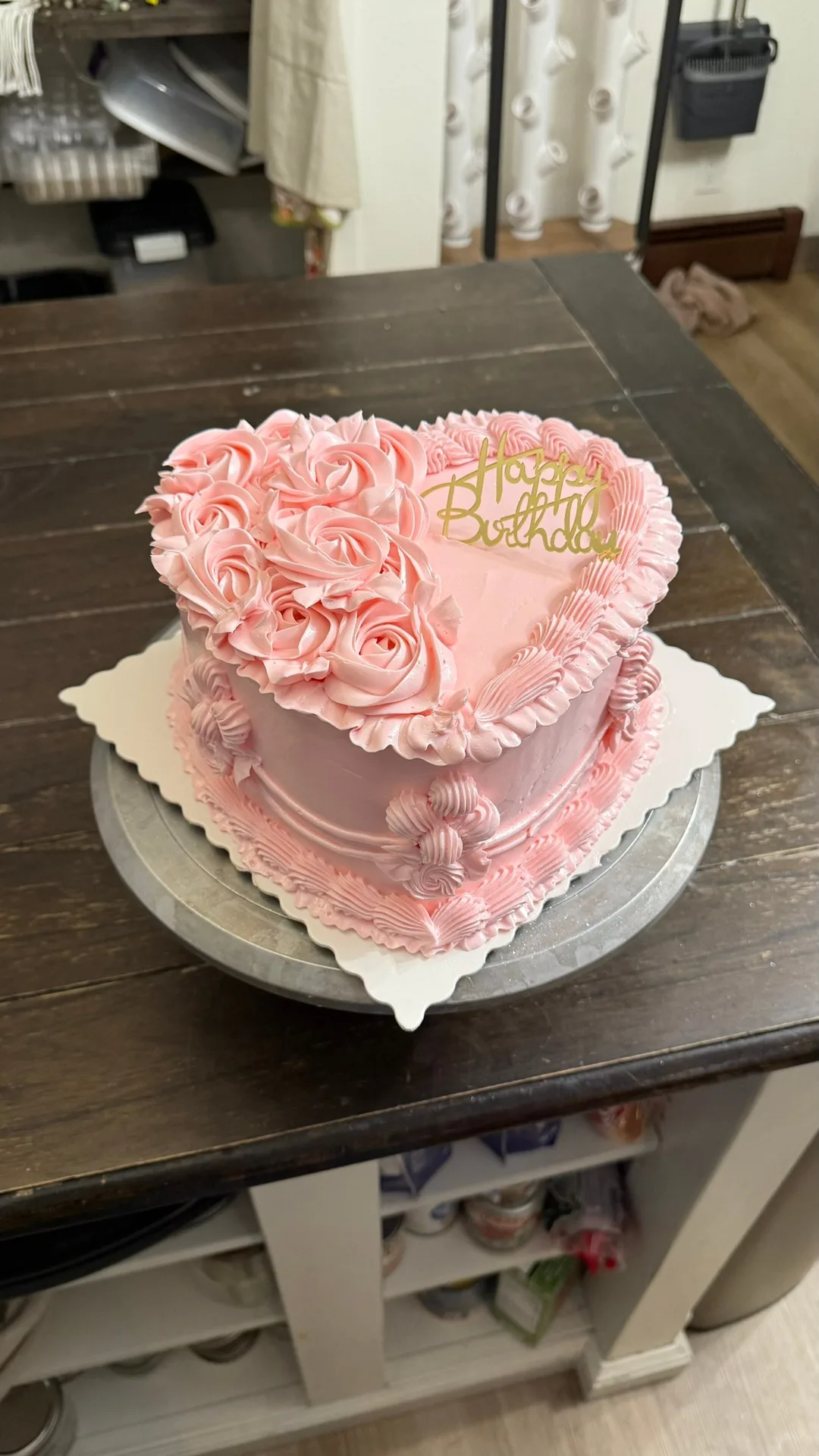 Pink rosette heart birthday cake