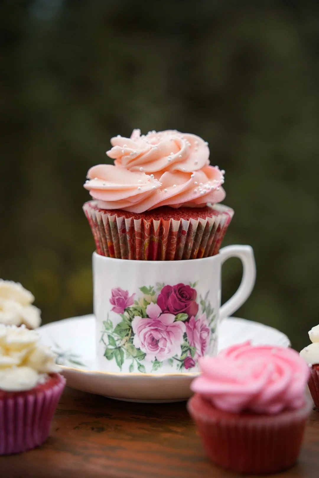 Red velvet cupcake in a vintage teacup